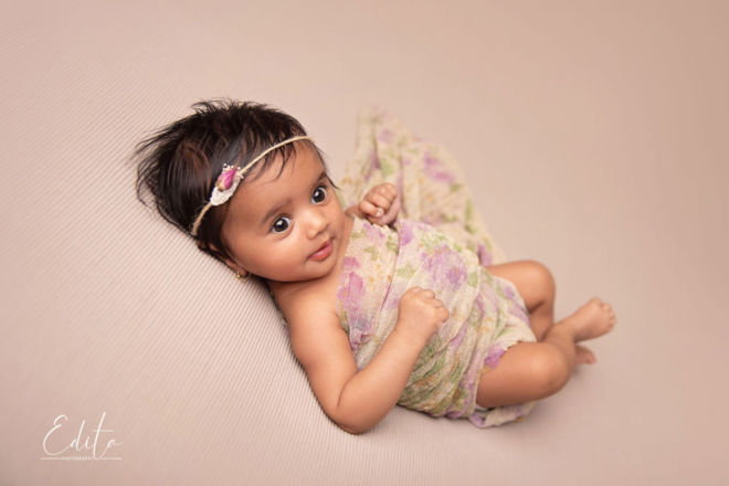 Little Baby Girl Poses On A White Chair She Is Smiling Happily Stock  Photo Picture And Royalty Free Image Image 73592601