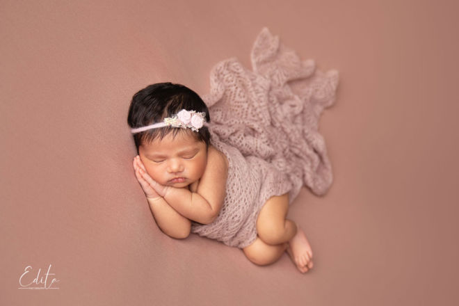 Newborn baby photoshoot side pose by Edita photography