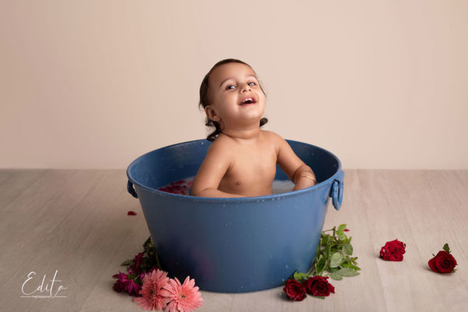 Milk bath for toddler girl in photo studio in Pune