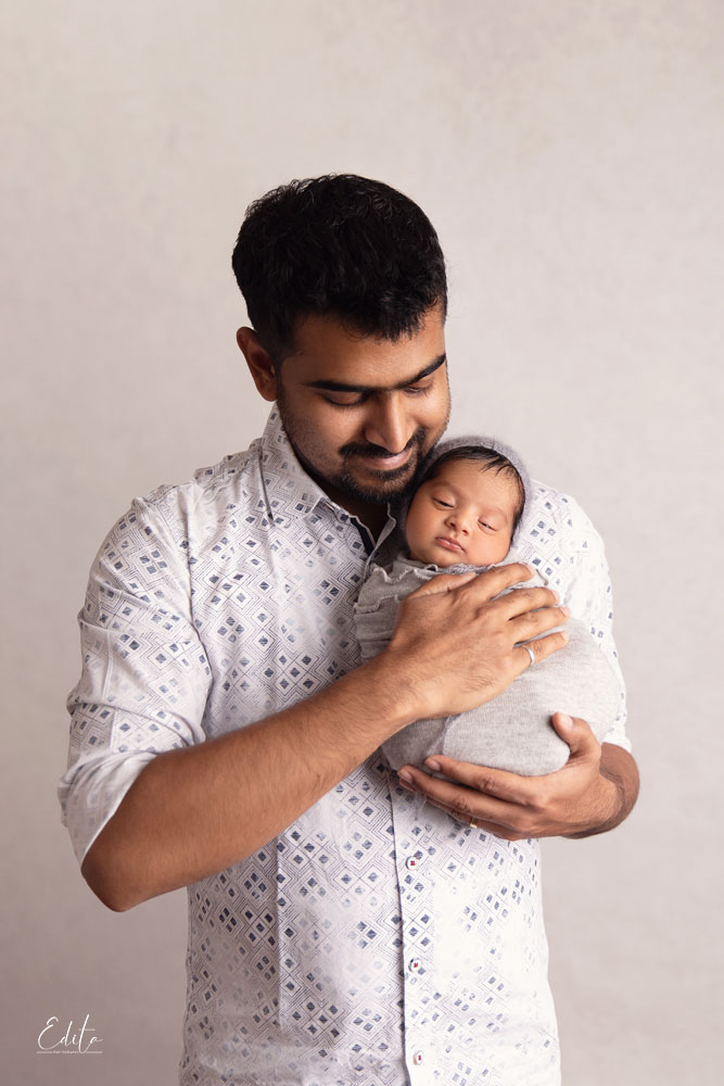 Father with newborn baby picture