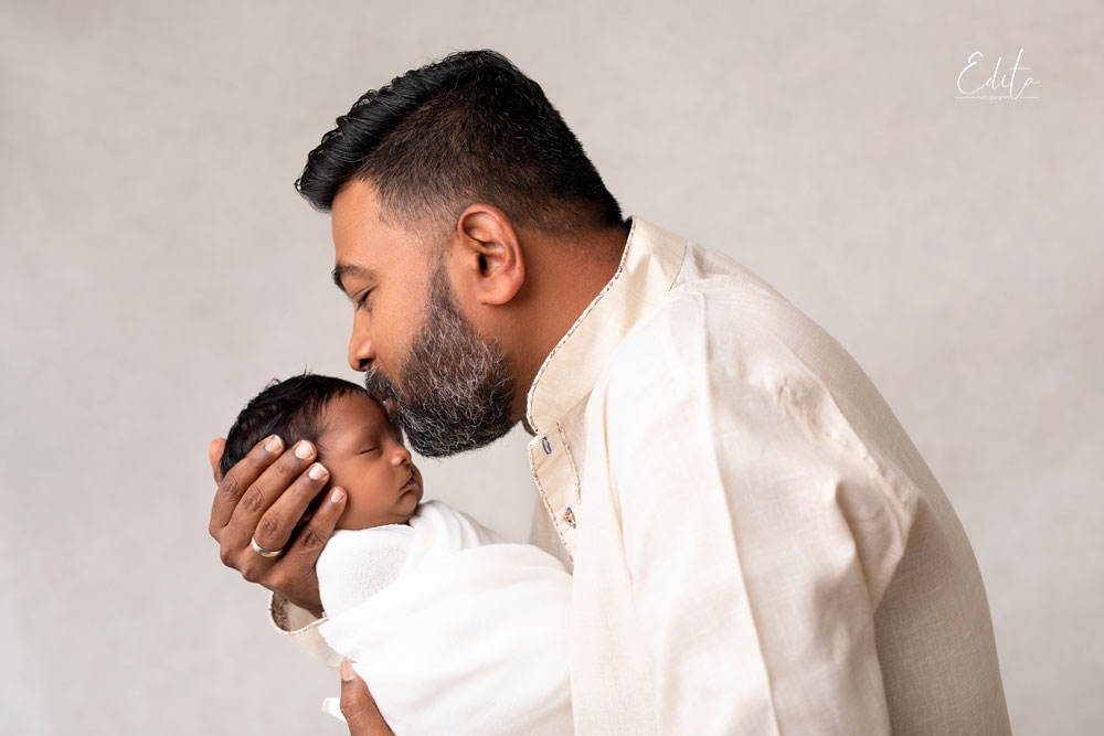Indian father and newborn baby photo in Pune. happy father's day