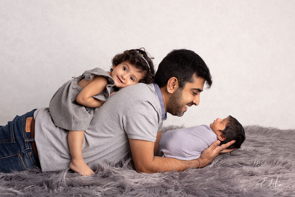 Father with 2 kids photo in Pune. Happy Father's Day