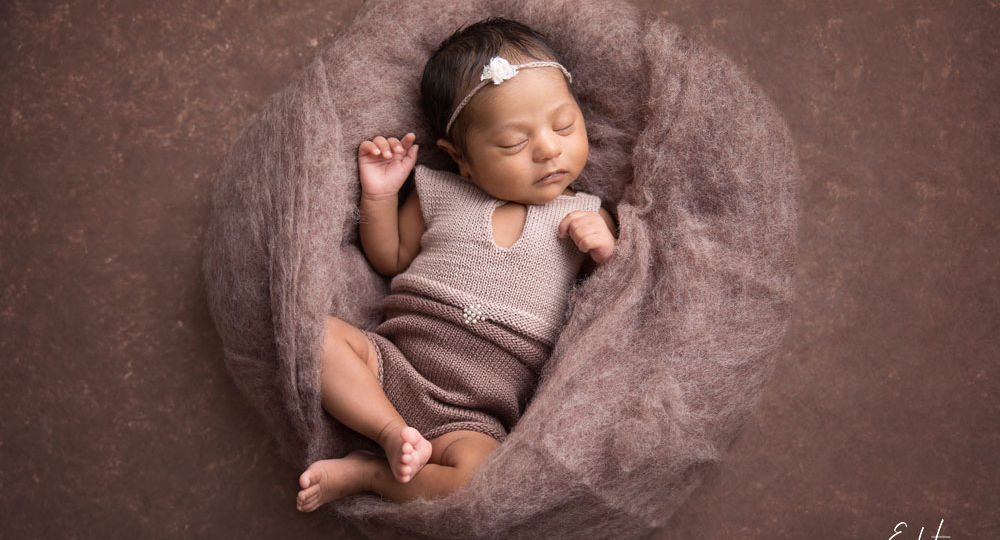 Newborn baby girl in brown wool by Edita photography best photographer in Pune