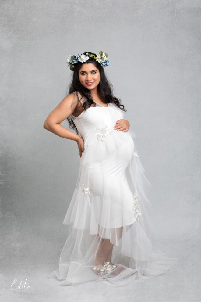 Maternity photography in white dress and beautiful tiara