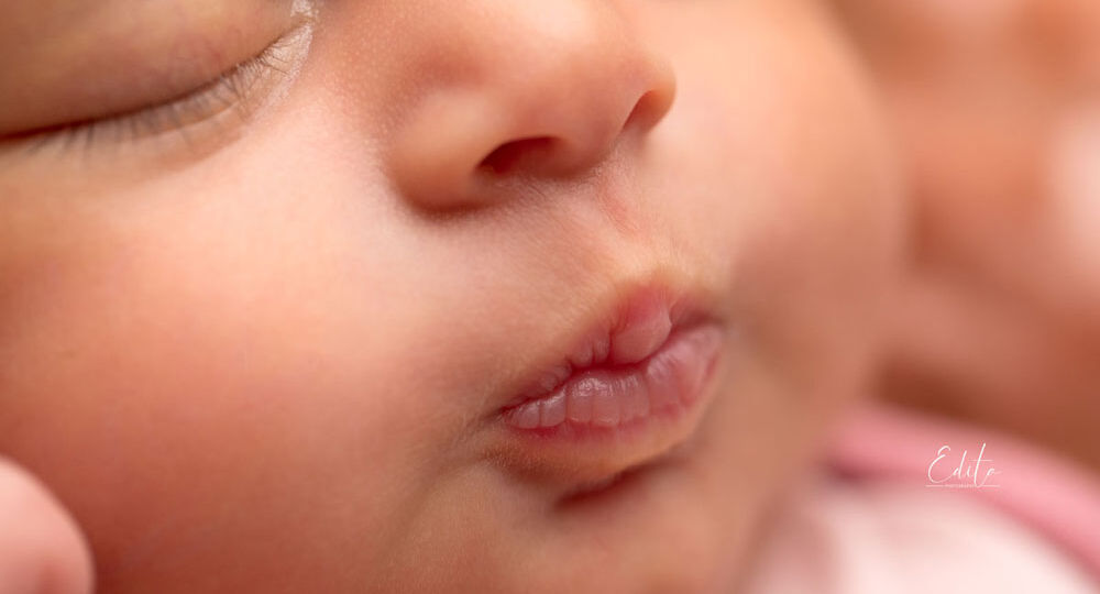 Newborn baby girl lips pout pic photo