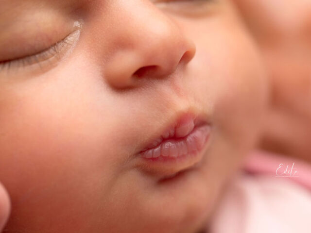 Newborn baby girl lips pout pic photo